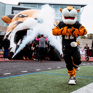 Towson University student operating media equipment